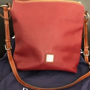 Dooney & Bourke red leather handbag w/duster.